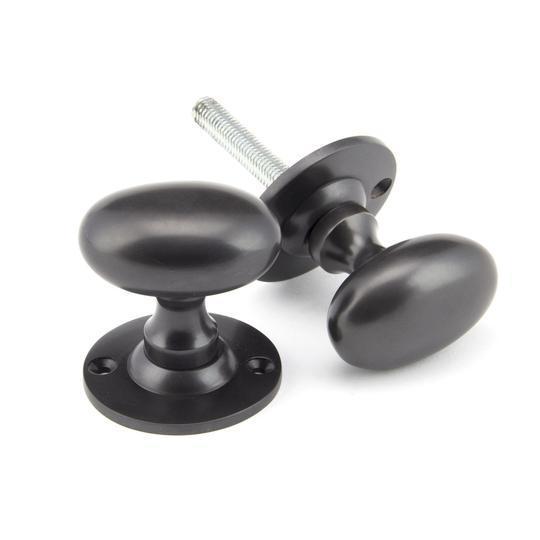 Aged Bronze Oval Mortice/Rim Knob Setin our Door Knobs collection by From The Anvil. Available to buy at Yorkshire Architectural Hardware