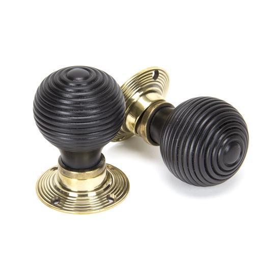 Ebony Mortice/Rim Beehive Knob Set - Aged Brass Rosesin our Door Knobs collection by From The Anvil. Available to buy at Yorkshire Architectural Hardware
