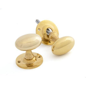 Polished Brass Oval Mortice/Rim Knob Setin our Door Knobs collection by From The Anvil. Available to buy at Yorkshire Architectural Hardware